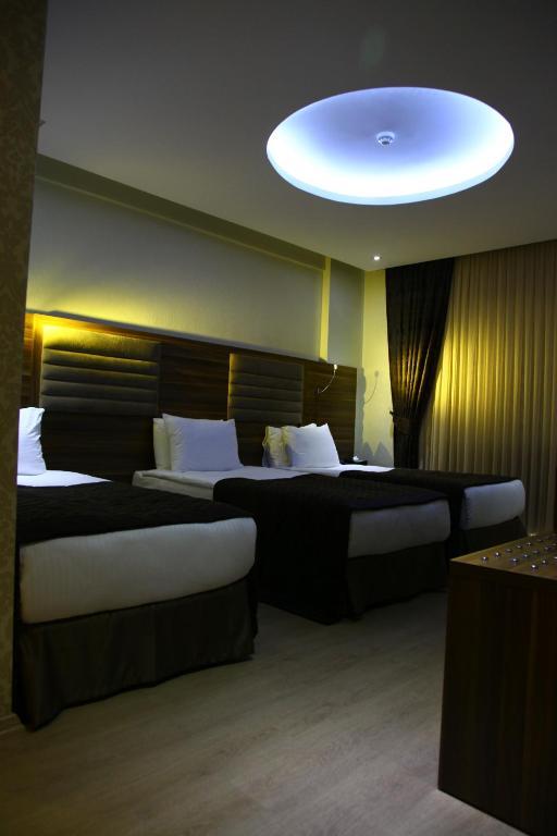 Adanava Hotel Стая снимка